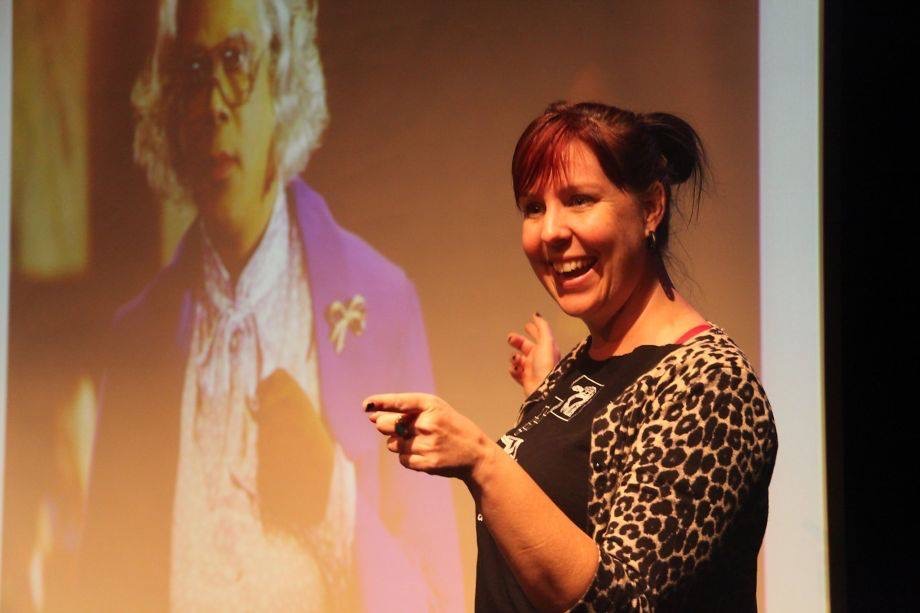 Kimberly at the first Speechless Inc (now Freestyle Love Supreme) in San Francisco giving a completely improvised talk in front of a slide of Medea. 